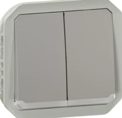 Kaksoismonitoimikytkin/-painikemekanismi Legrand Plexo 10 A IP55 merkkivalolla, harmaa